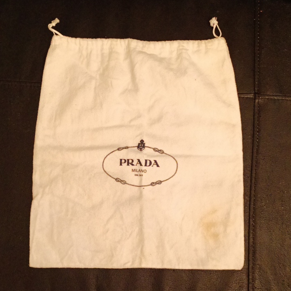 Prada Milano soft clutch bag sleeper bag measures 12.5 wide x 13.5 deep